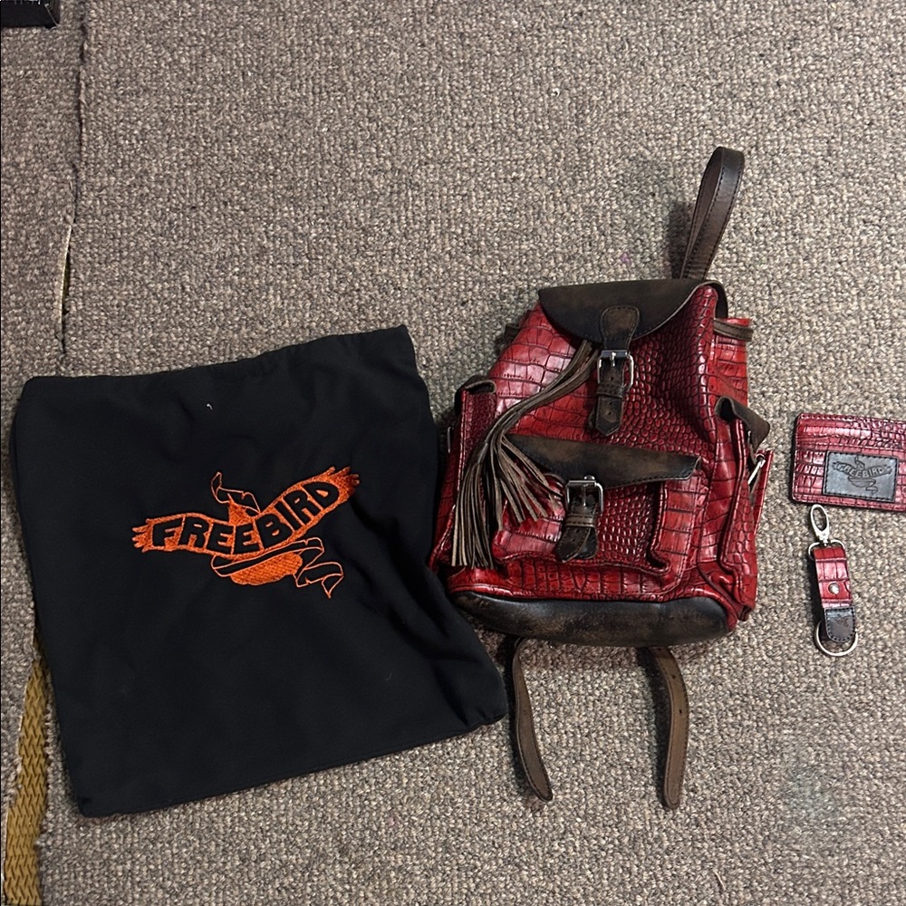 Freebird- red crocodile backpack with key chain and wallet NEVER USED